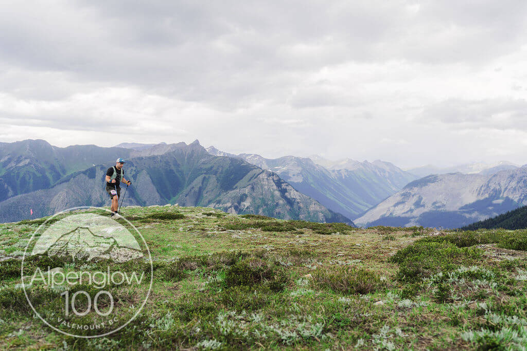 Alex Wingert, Founder of Goodwing Outfitters, trail running in the mountains